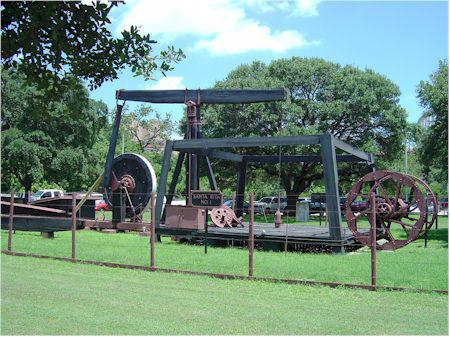 The Santa Rita #1 within site of the Memorial Stadium on the University of Texas Campus